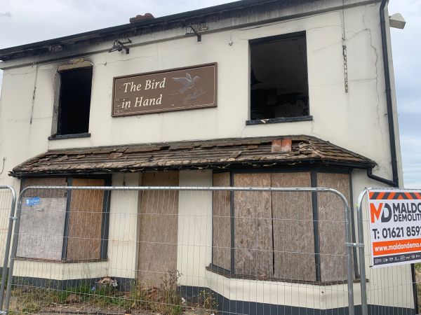 Bird in Hand, Earls Colne boarded up before demolition in 2022