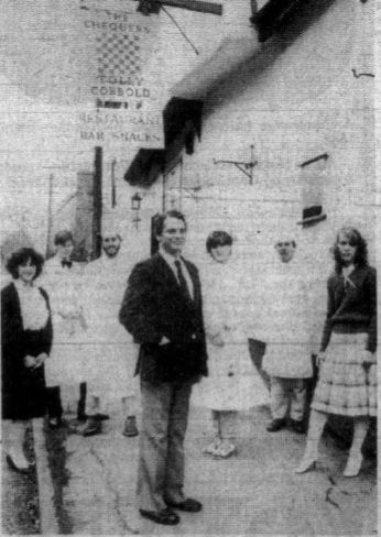 Mr Norman Rushton of the Chequers, Fowlmere with some of his staff - in 1982