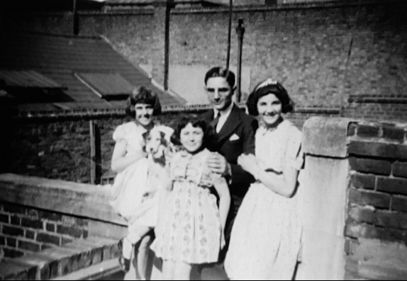 Sadie (the littlest one) -  with Edward, Joan & Alma on the flat roof (which still exists) at the back of the Carlton Tavern. 