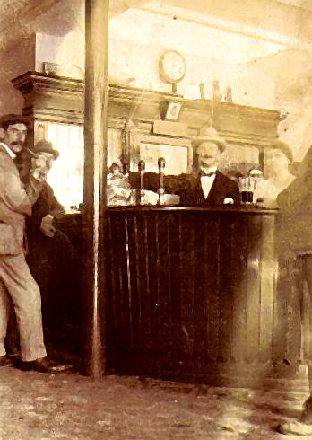 Inside the Coach & Horses with Sidney Frank & Alice (nee Linford) behind the bar
