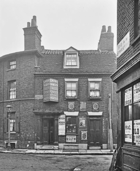 The Earl Grey, Straitsmouth, Greenwich in 1912; the original building is propped up with timber shoring, shortly before its demolition.