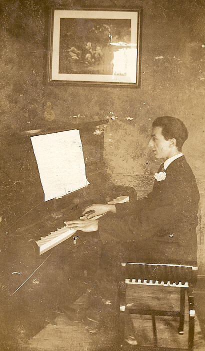 My grandfather, William Seear, playing the piano in the Pooles Park Tavern, Finsbury Park; circa mid 1920s to mid 1930s (I'm inclined to think 1920s as he doesn't appear to be wearing a wedding ring).