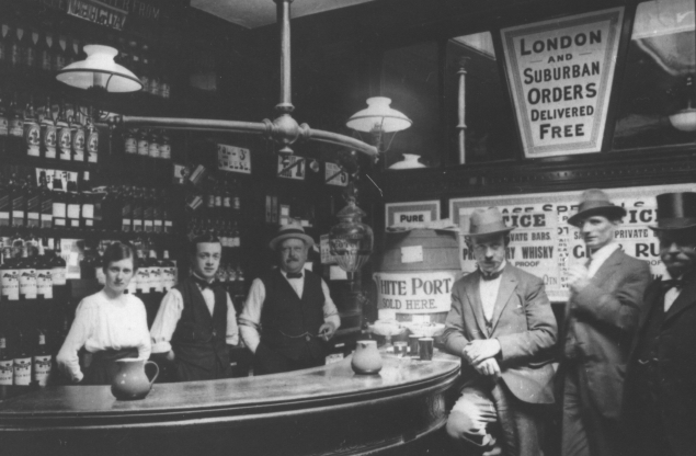 The interior of the Temple Bar in Walworth Road has my grandfather, Henry James ROBINS, in hat, with my father, Harry ROBINS