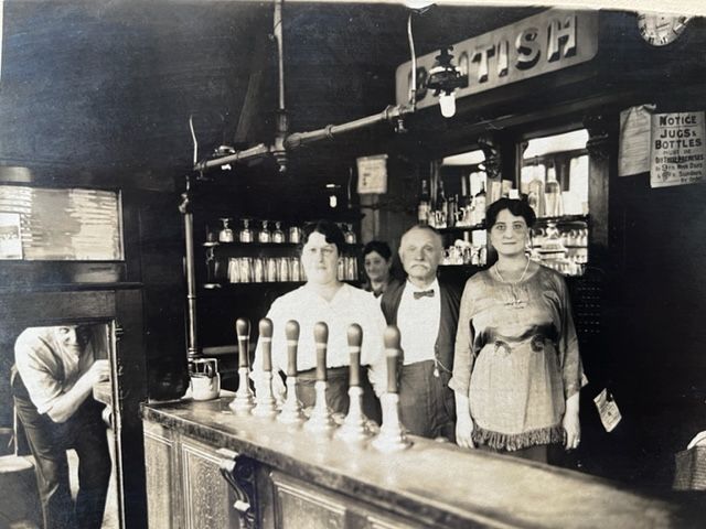 British Prince, 49 Bromley Street, circa 1920 - with licensee John Raphael  and family inside and behind the bar