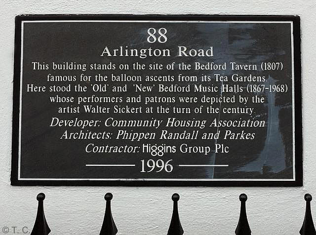 Plaque to 88 Arlington Road reads 'This building stands on the site of the Bedford Tavern (1807) famous for the balloon ascents from its Tea Gardens. Here stood the old and new Bedford Music Halls (1867 - 1968) whose performers and patrons were depicted by the artist Walter Sicket at the turn of the century.'