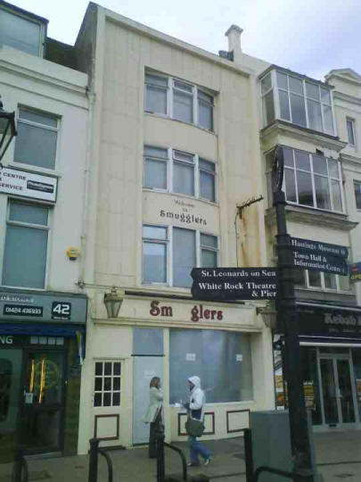 the building as it is today (2010), boarded up with steel shutters