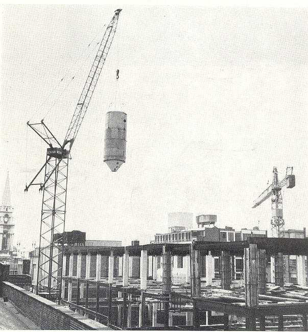 A conical fermenter is poised in transit from the old to the new brewery. This vessel was installed in the old brewery in 1968, and as a result all the new fermenters are of this type.