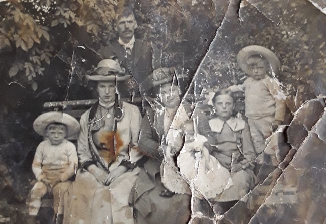 Samuel John Johnson and the whole family including grandad's sister Kate.  My mother is the baby on grannie's lap.  She was born in 1913.